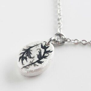 Vintage iridescent white pearl boho feather necklace with a small silver chain